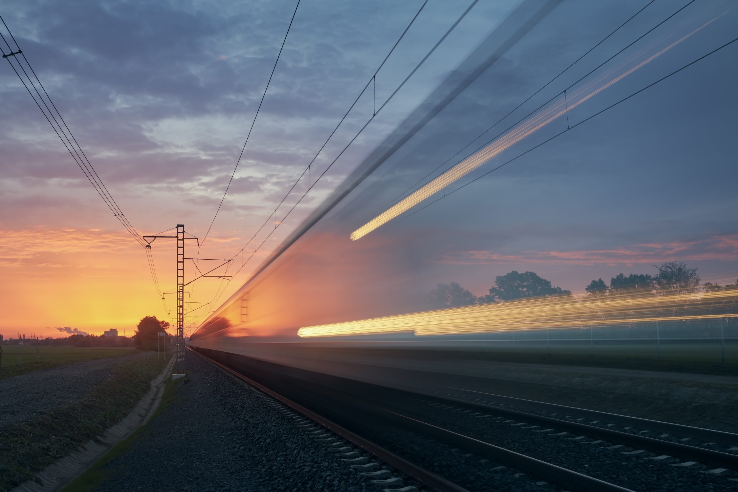 Light trail of train on railroad track light-trail-of-train-on-railroad-track-2025-02-16-09-56-17-utc-scaled